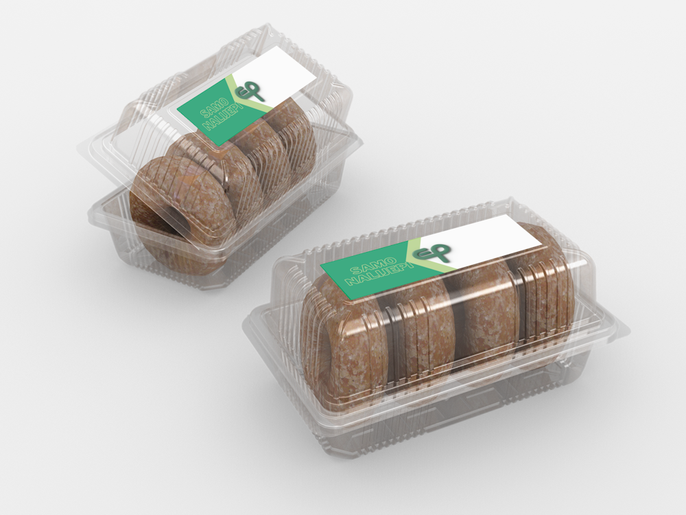 Dvije plastične kutijice prozirne s proizvodom unutra, na poklopcu naljepnice s logom i natpisom